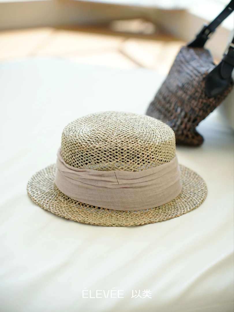 以类设计师品牌CHIC GALAXY时尚平顶丝带镂空编织草帽46115