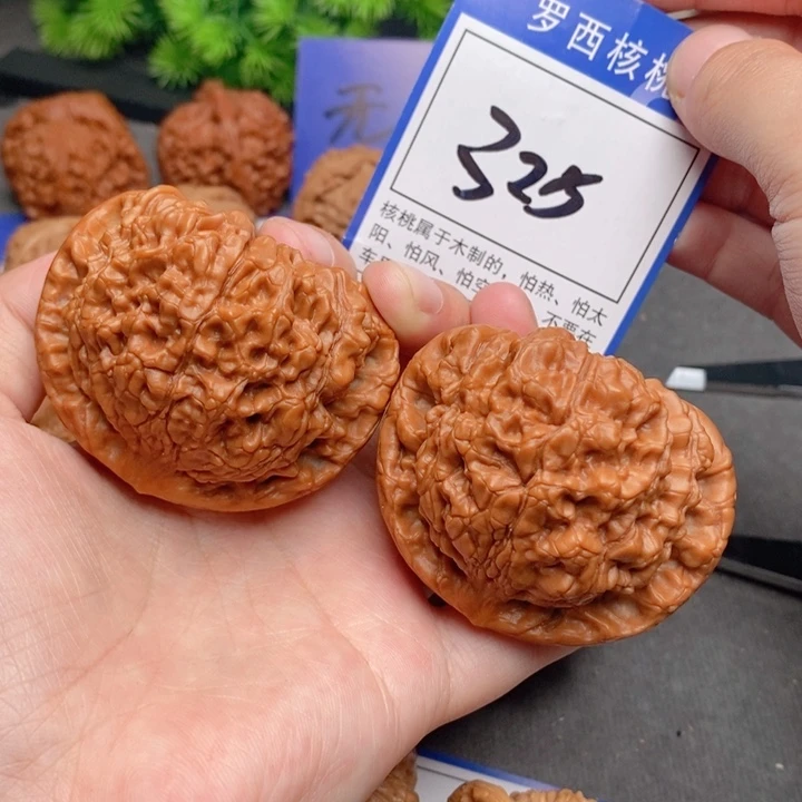 桃核把件54.8官帽325号牌