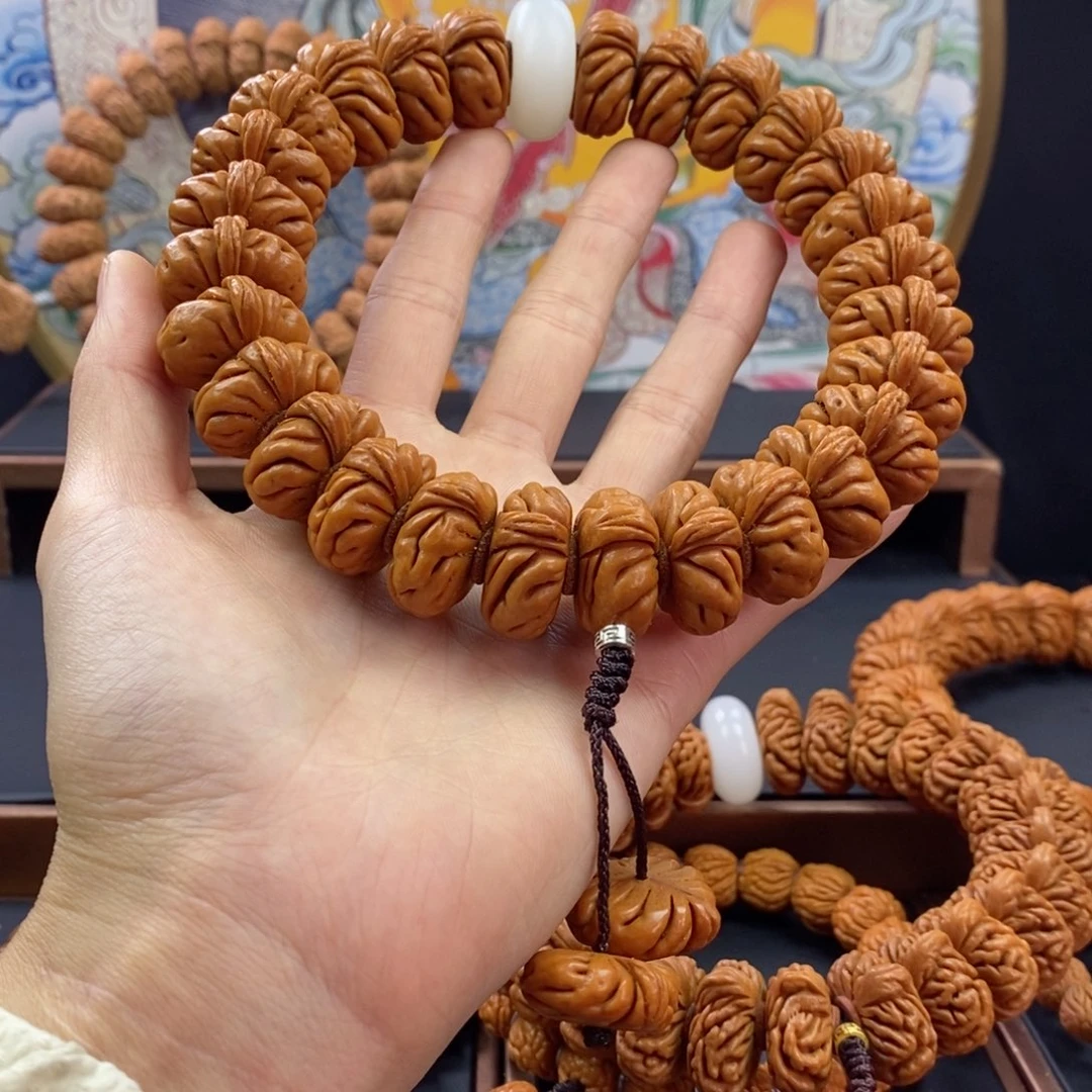 桃核手串龙纹桃核白玉龙