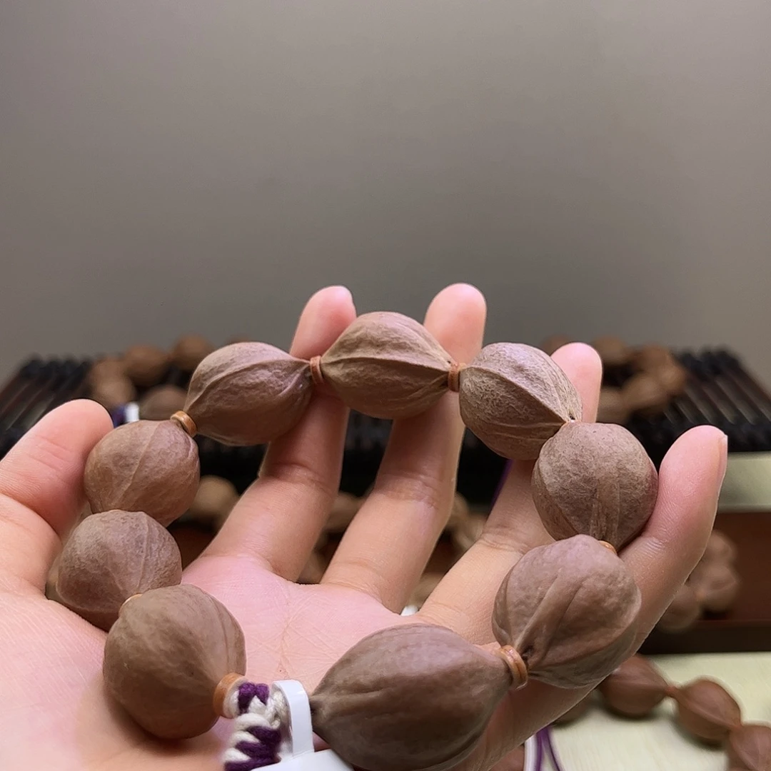 大***王吊坠橄榄核梅林铁核文玩手串