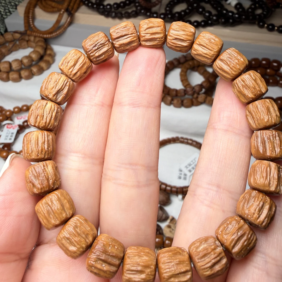 紫金鼠实心手工雕刻百香10✖️9黄皮料单圈手串