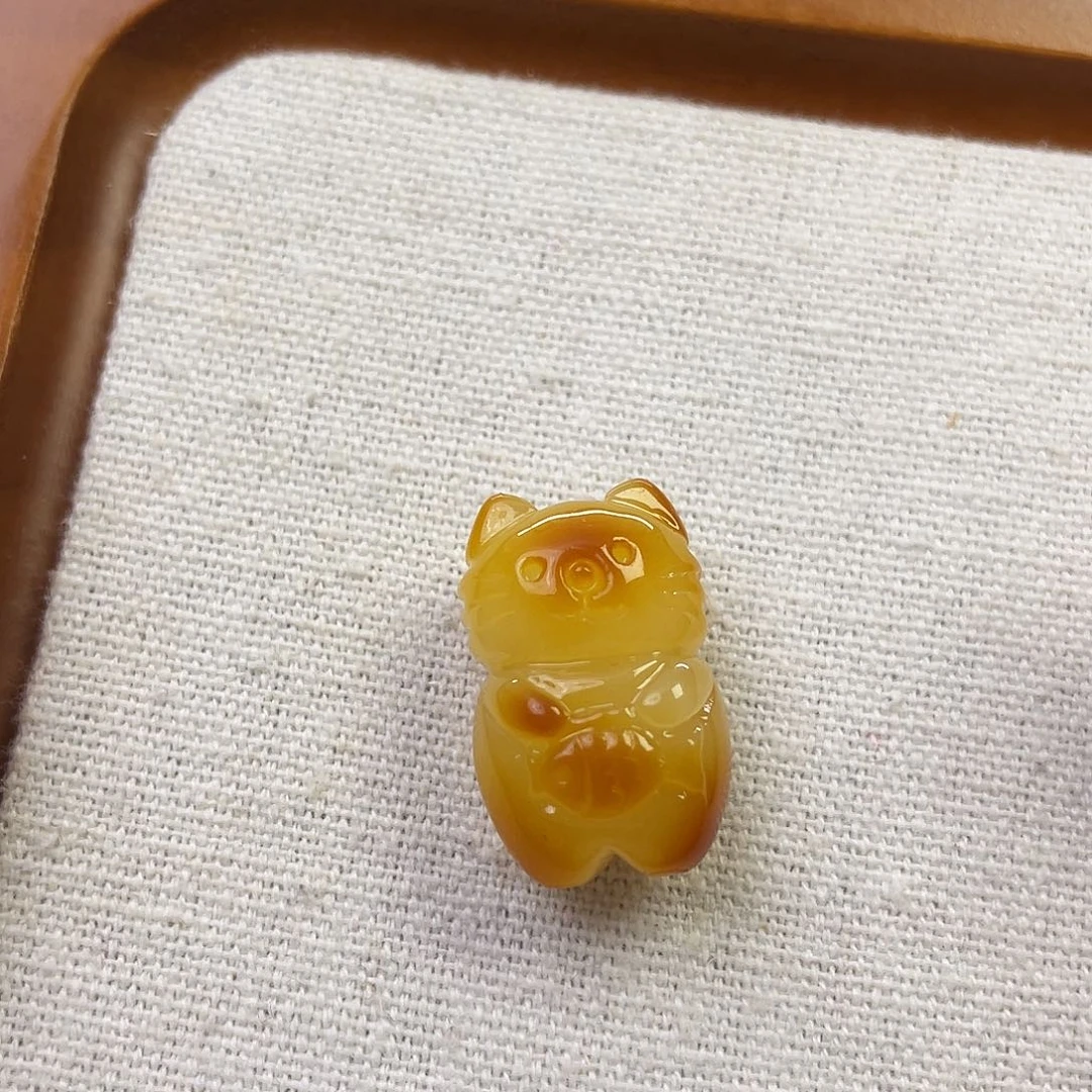 裸石琥珀未镶嵌小猫吃鱼