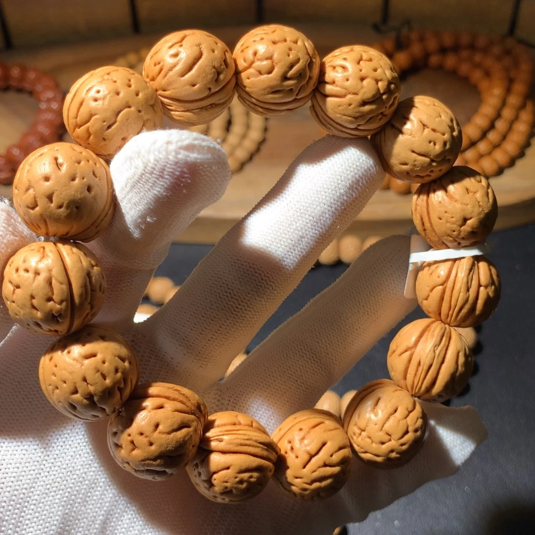 蓝***花手串桃核东北野生大肌肉18+