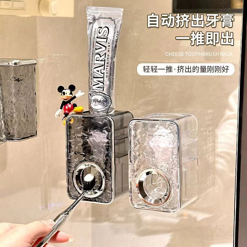 水波纹壁挂挤牙膏器轻奢高颜值浴室免打孔家用浴室洗漱台挤牙膏器