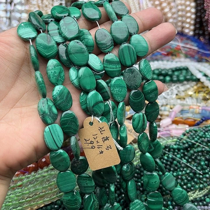 玛瑙/玉髓未镶嵌珠宝半成品一条12/16mm孔雀石椭圆片有瑕