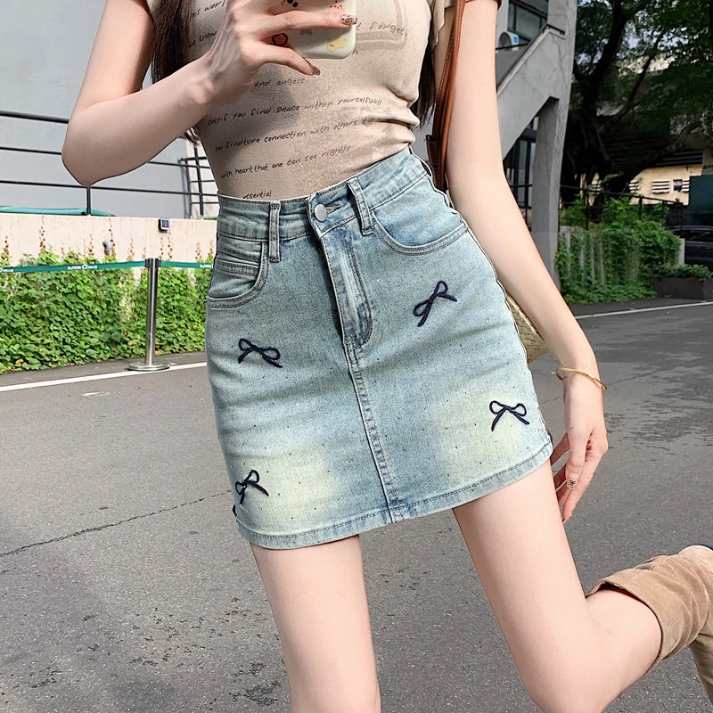 蝴蝶结刺绣烫钻牛仔短裙女春夏新款高腰显瘦百搭A字半身裙带内衬