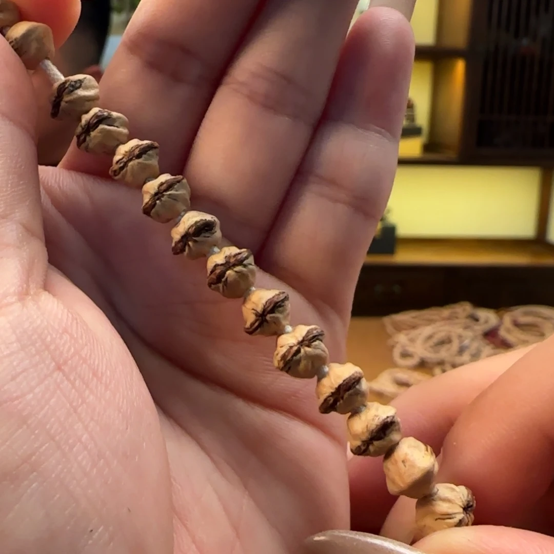 柏香籽/百香籽手串红牙横打7左右