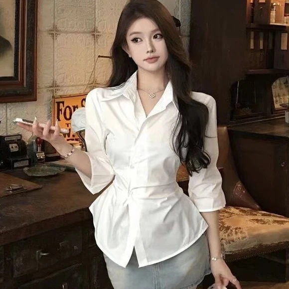欲收腰白色不规则辣妹衬衫女夏季显瘦小众衬衣设计感气质上衣潮
