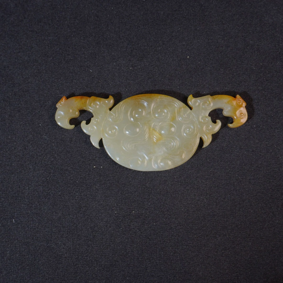 41D12 清 和田玉出廓兽面佩