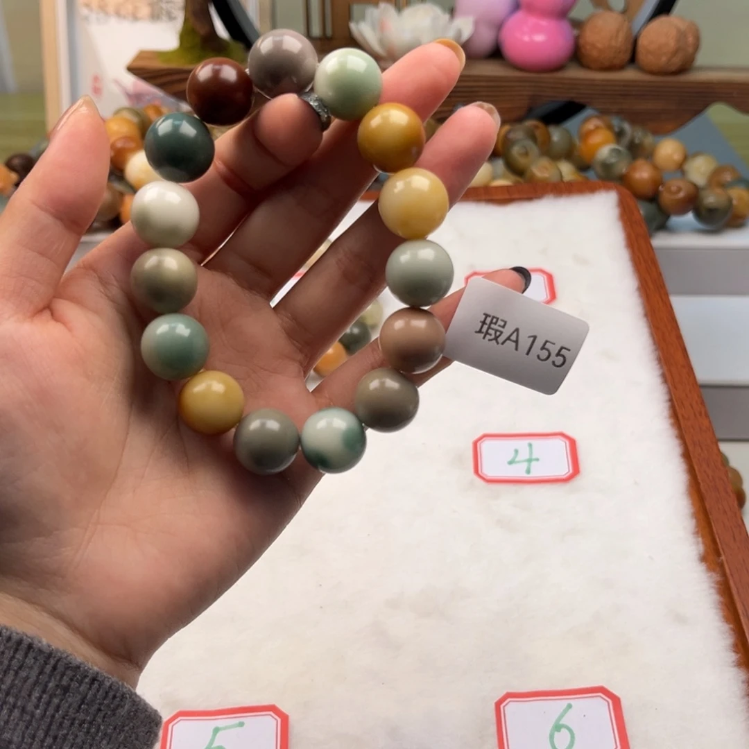 菩提根/象牙果吊坠14mm圆珠一串瑕A155