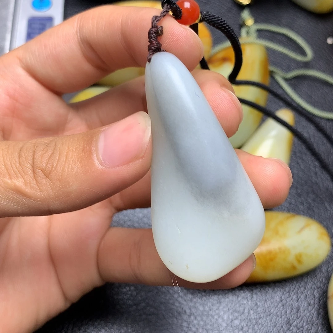 和田玉未镶嵌挂件疲***头