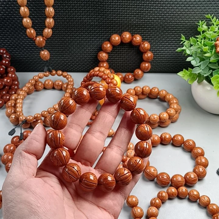 手串桃核铁籽密纹黄皮15