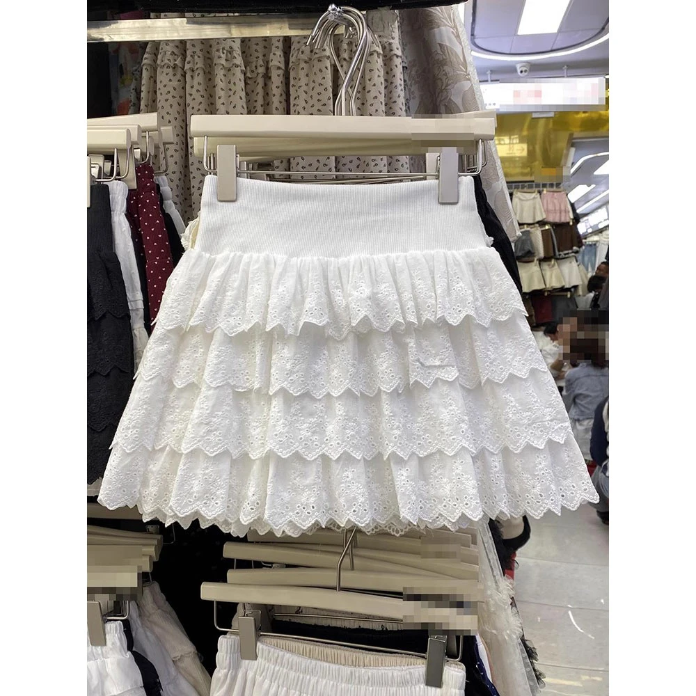 重工镂空蛋糕短裙女2025年春夏新款高级感松紧腰A字纯色半身裙潮