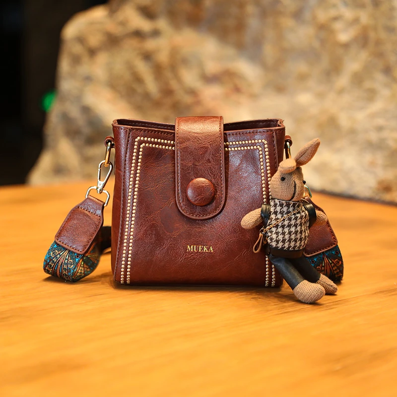 【MUEKA/茉妮卡】高级感单肩水桶包女2024新款百搭斜挎包复古包包