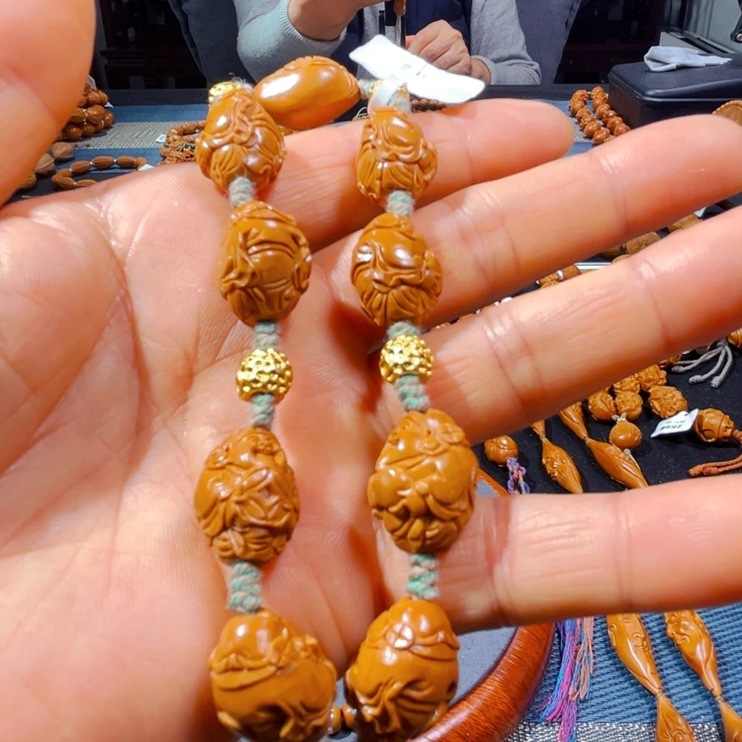 橄榄核吊坠新人在这里