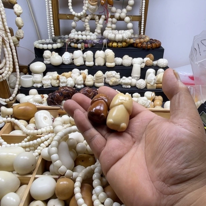 那****父象牙果雕刻丁丁两颗微瑕不退换