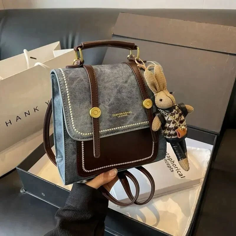 高级感小型牛仔一包三用双肩包女2025新款时尚斜挎短途旅行小背包