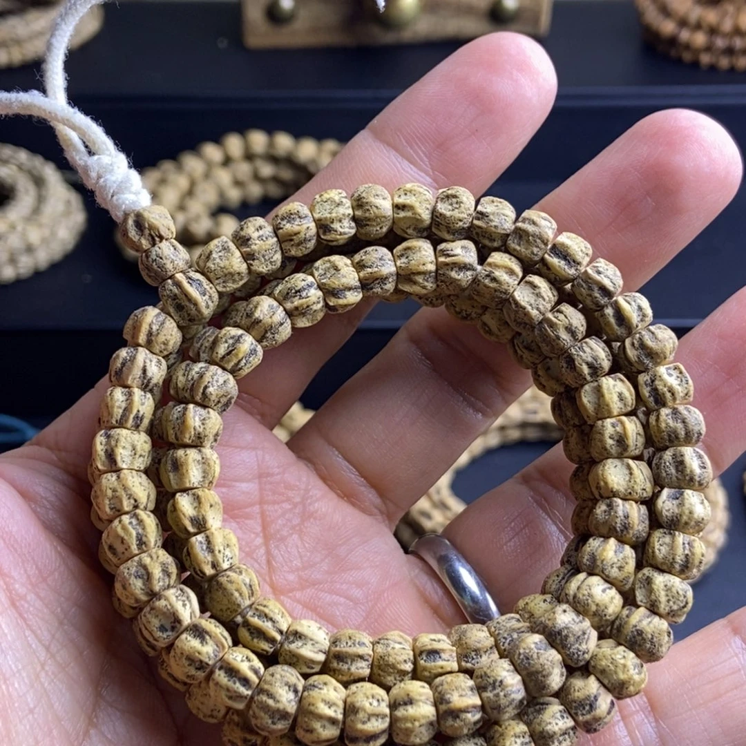 阳***孩吊坠柏香籽/百香籽