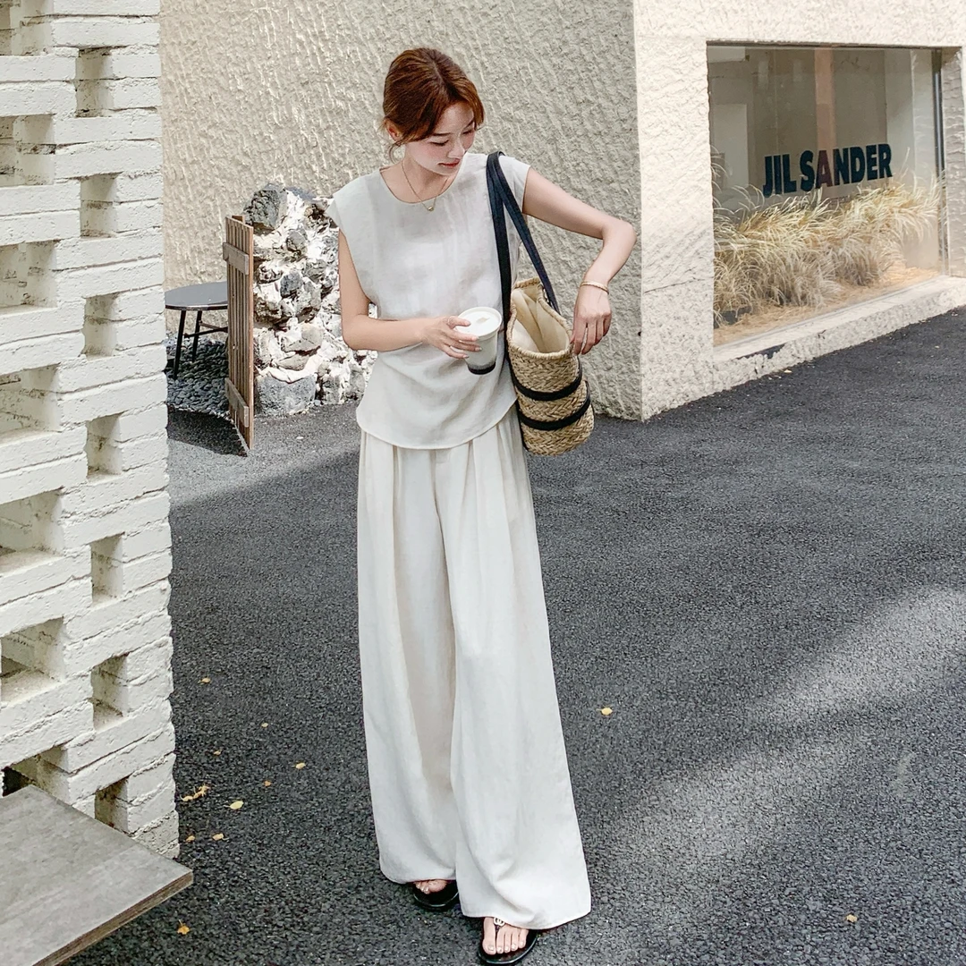 米白色御姐风气质套装女2025夏新款法式垂感上衣高腰阔腿裤两件套