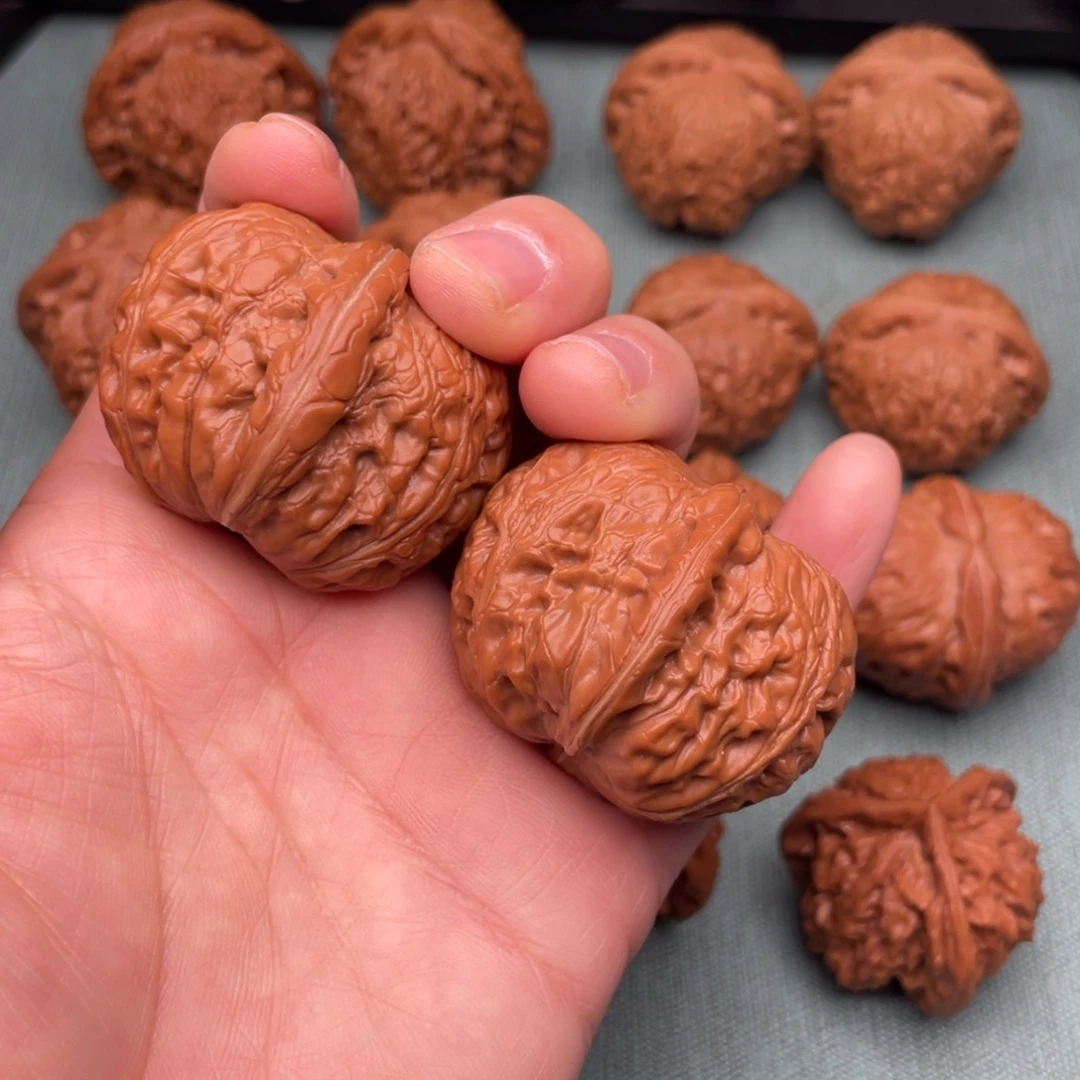 文玩核桃把件42红皮老树元宝