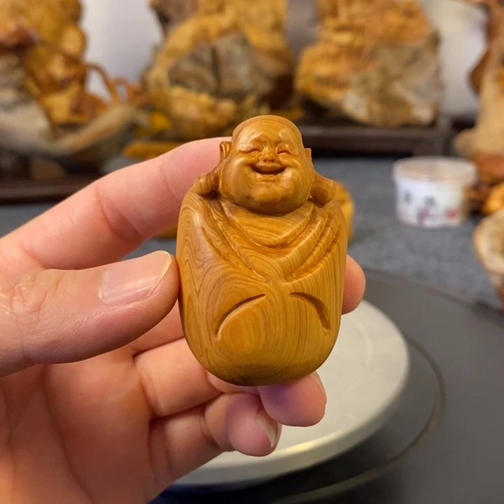 柏木（崖柏）弥勒佛手把件