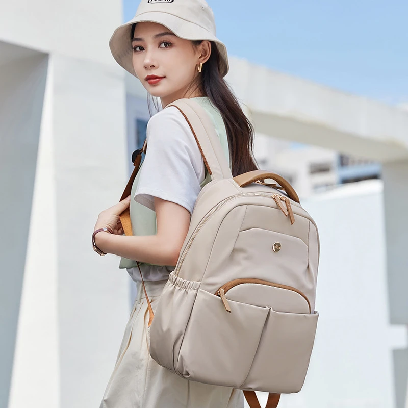 双肩包胜者新款时尚帆布撞色背包大容量简约大学生书包电脑包