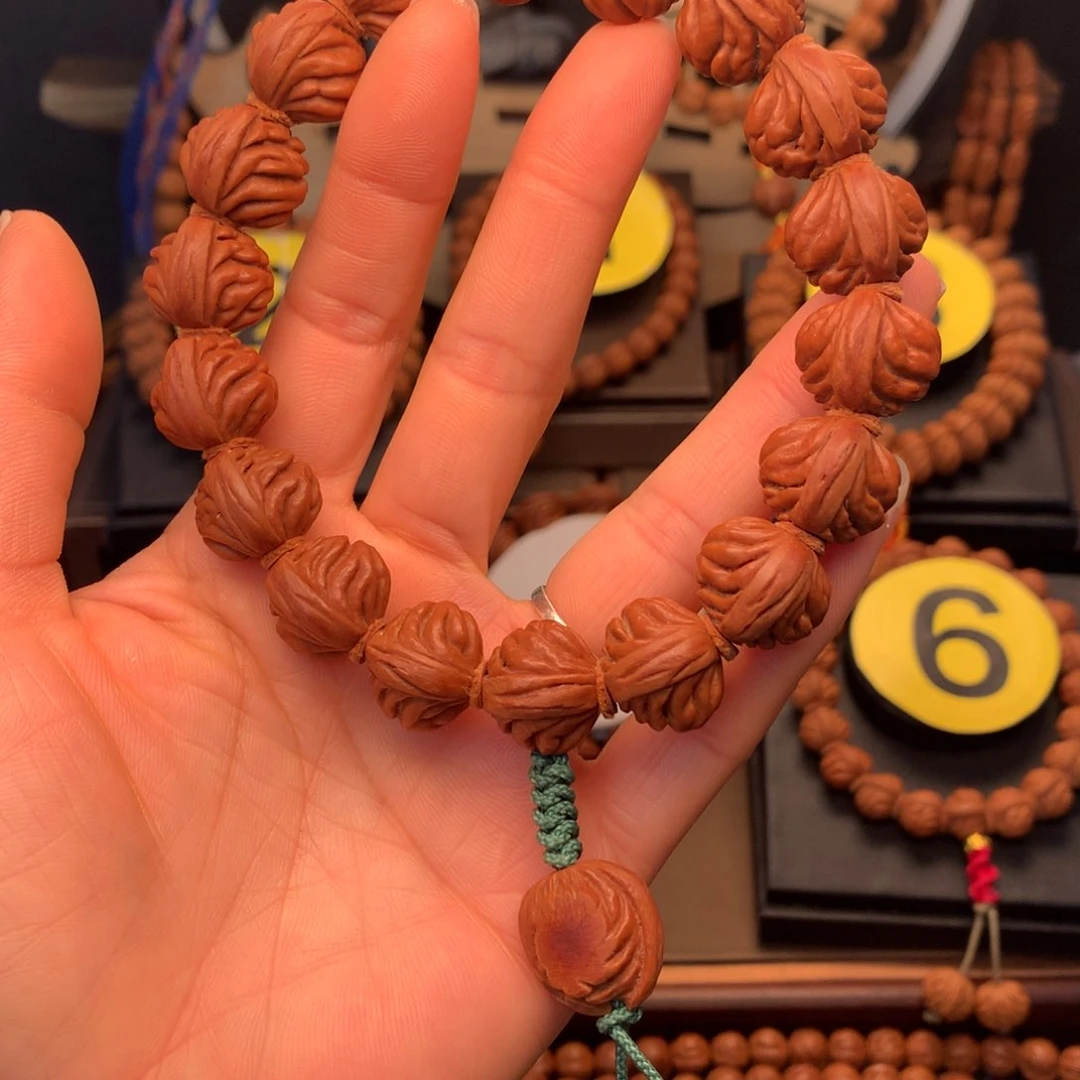 桃核手串h****n野生红魔15加弟子珠，送两颗备籽