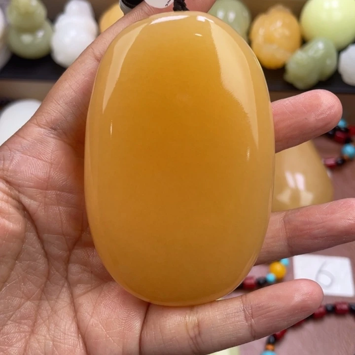 洪***缘石材天然古青石手把件