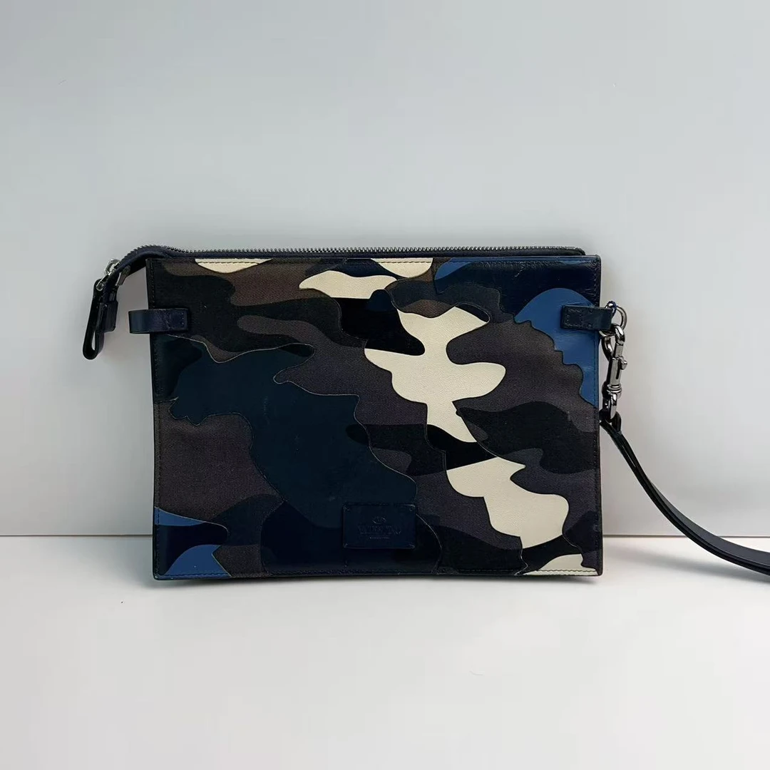 95新 Valentino/华伦天奴 华伦天奴拼色百搭手拿包