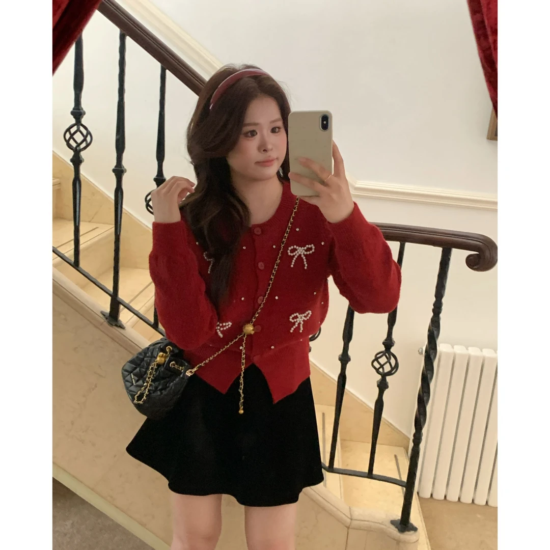 【圣诞甜心】大头婷微胖定制特别致蝴蝶结毛衣搭百搭丝绒半裙 M2069