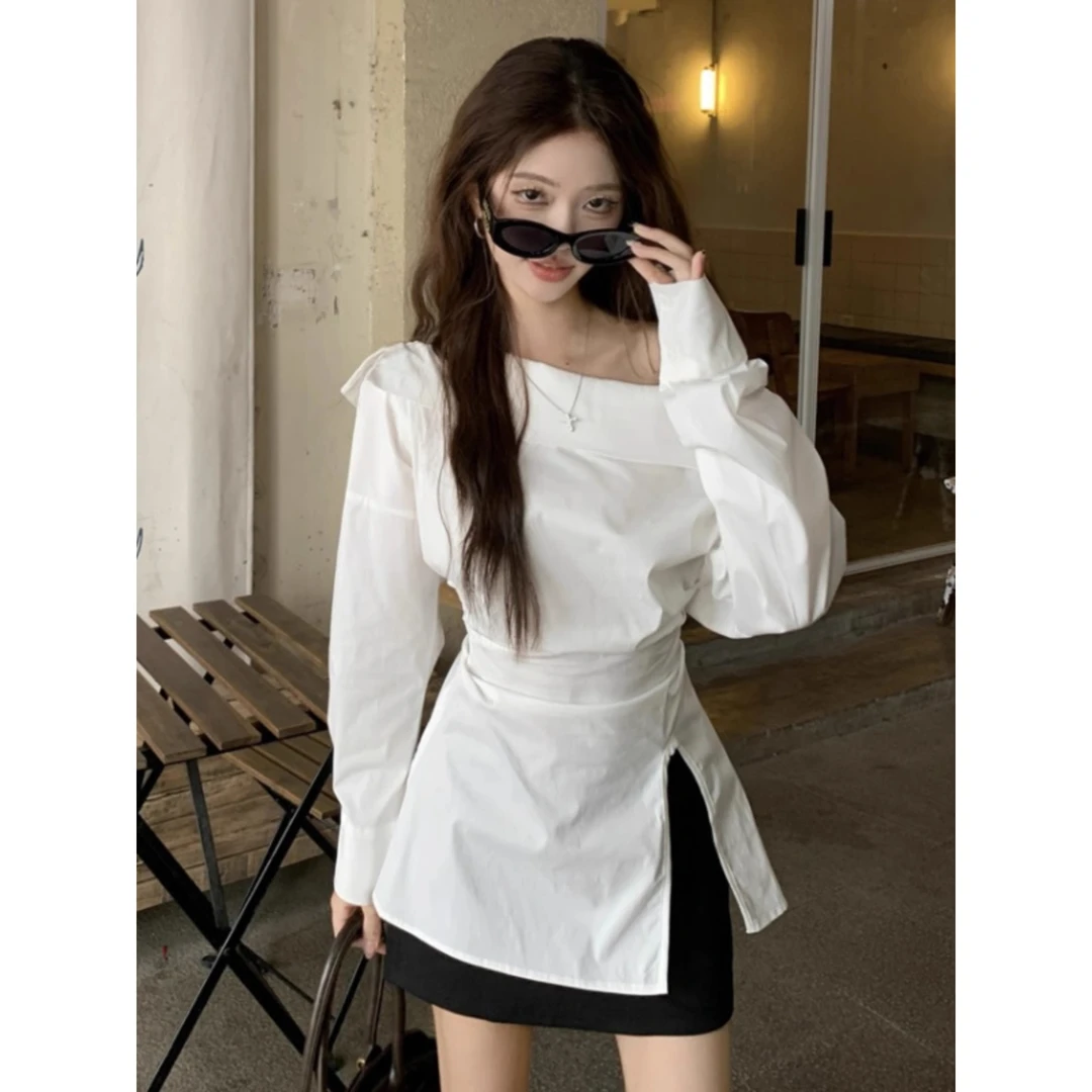 法式高级设计感一字肩长袖衬衫女春秋收腰开叉中长款气质露肩上衣