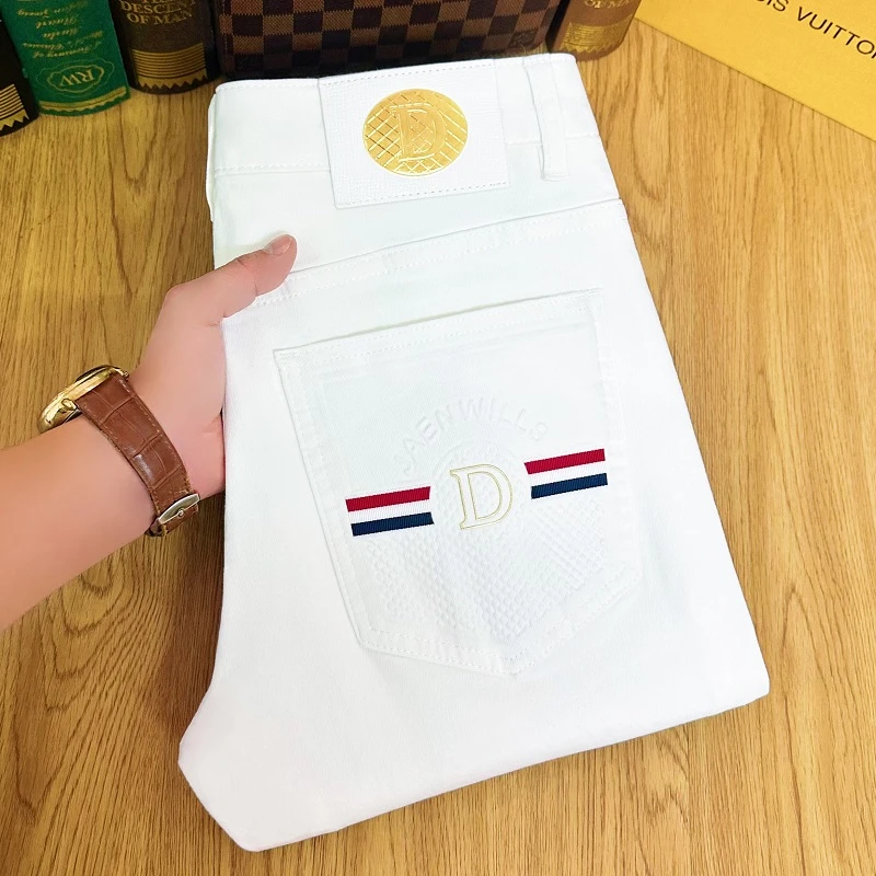 春季纯白牛仔裤男款2025新款高端潮流休闲百搭修身小脚长裤子爆款