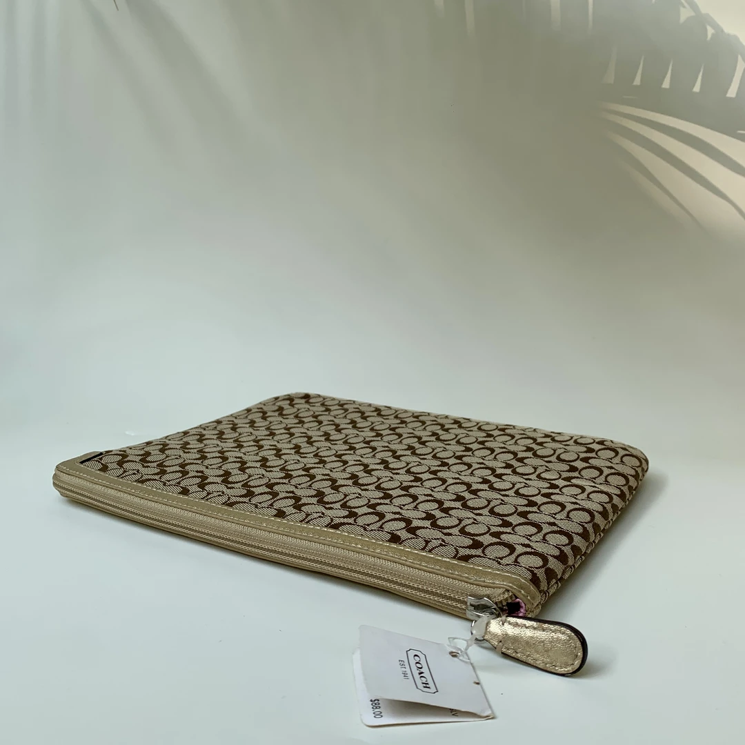 95新 COACH/蔻驰 经典棕色老花必备单品ipad收纳包内胆包手拿包