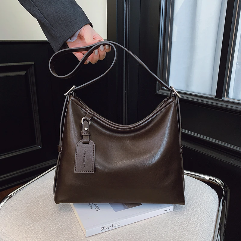 今年流行包包女士2025新款复古大容量托特包高级感百搭单肩斜挎包