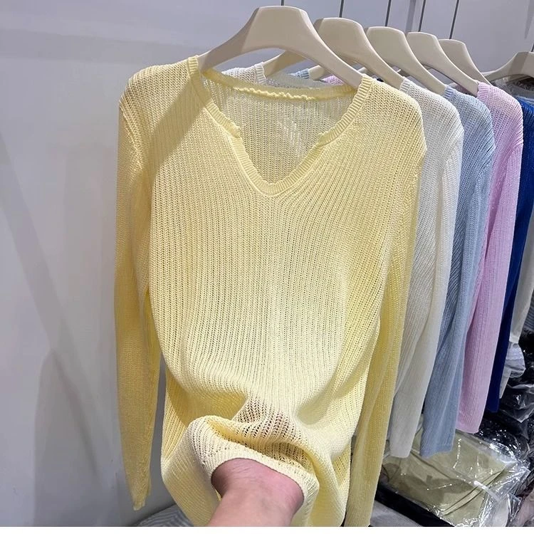 温柔风夏季薄款宽松长袖罩衫女2025新款超好看独特镂空针织衫上衣