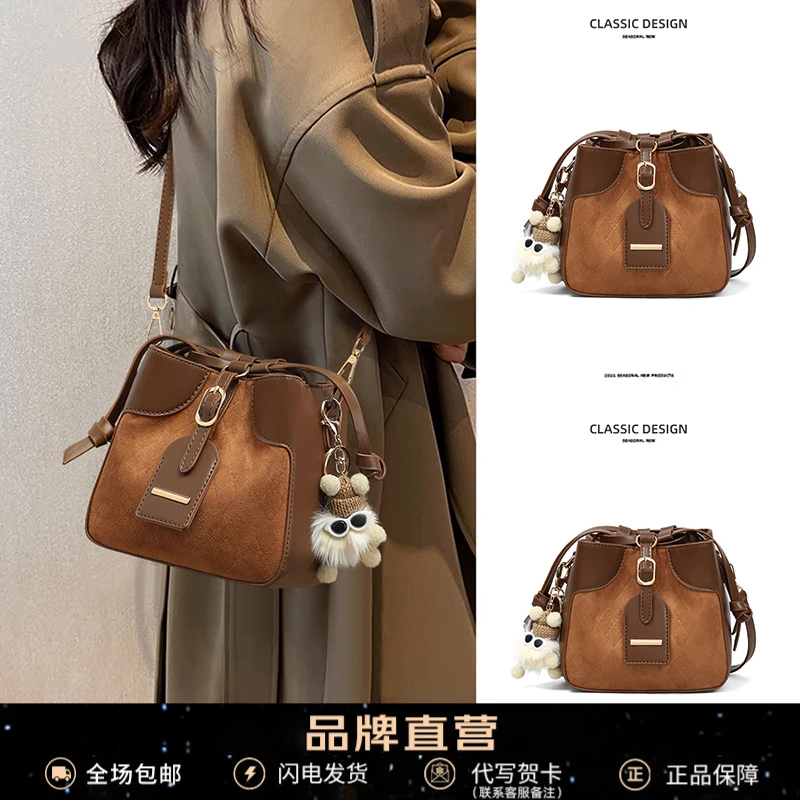 Viney包包女大容量拼接百搭水桶包单肩包网红通勤撞色抽带斜挎包