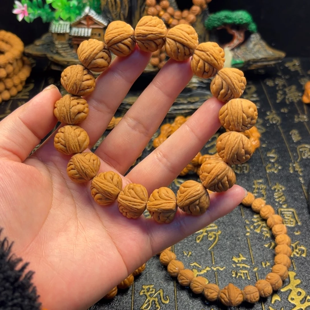 子****桃核手串豹子头手串