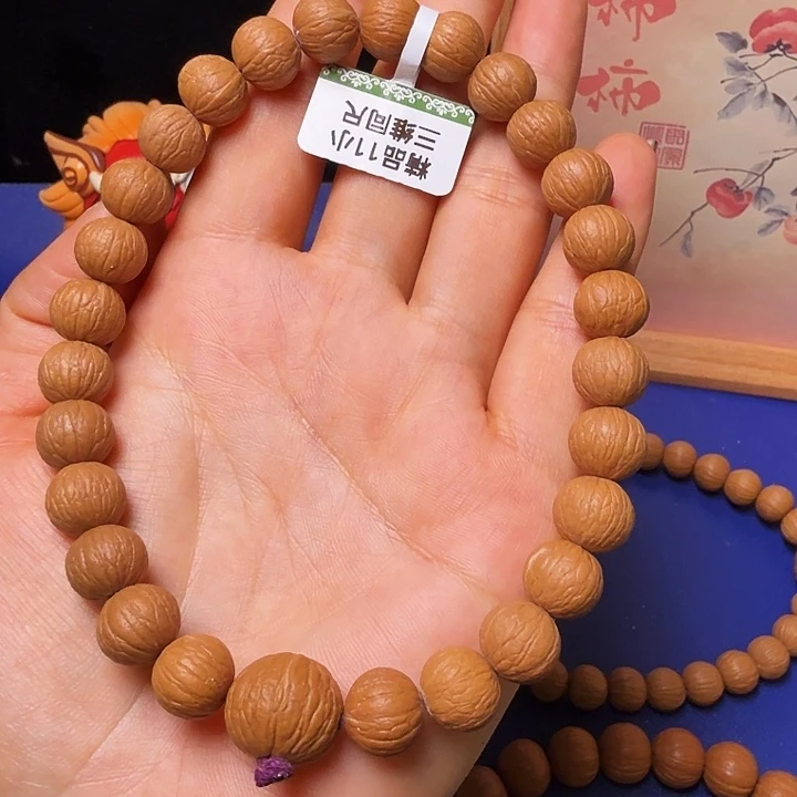 别***愣猴头核桃吊坠凤羽