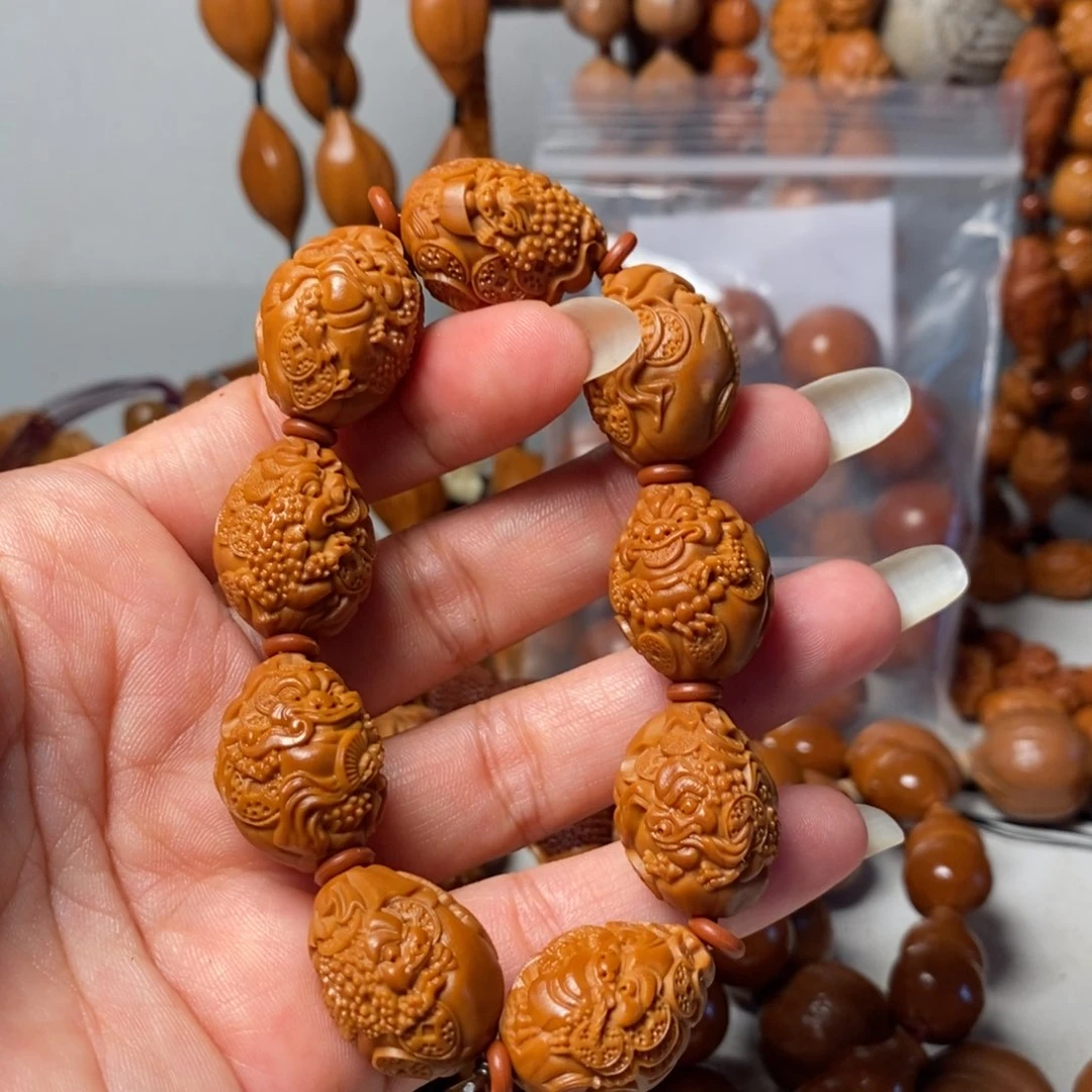 橄榄核吊坠钱袋金蟾