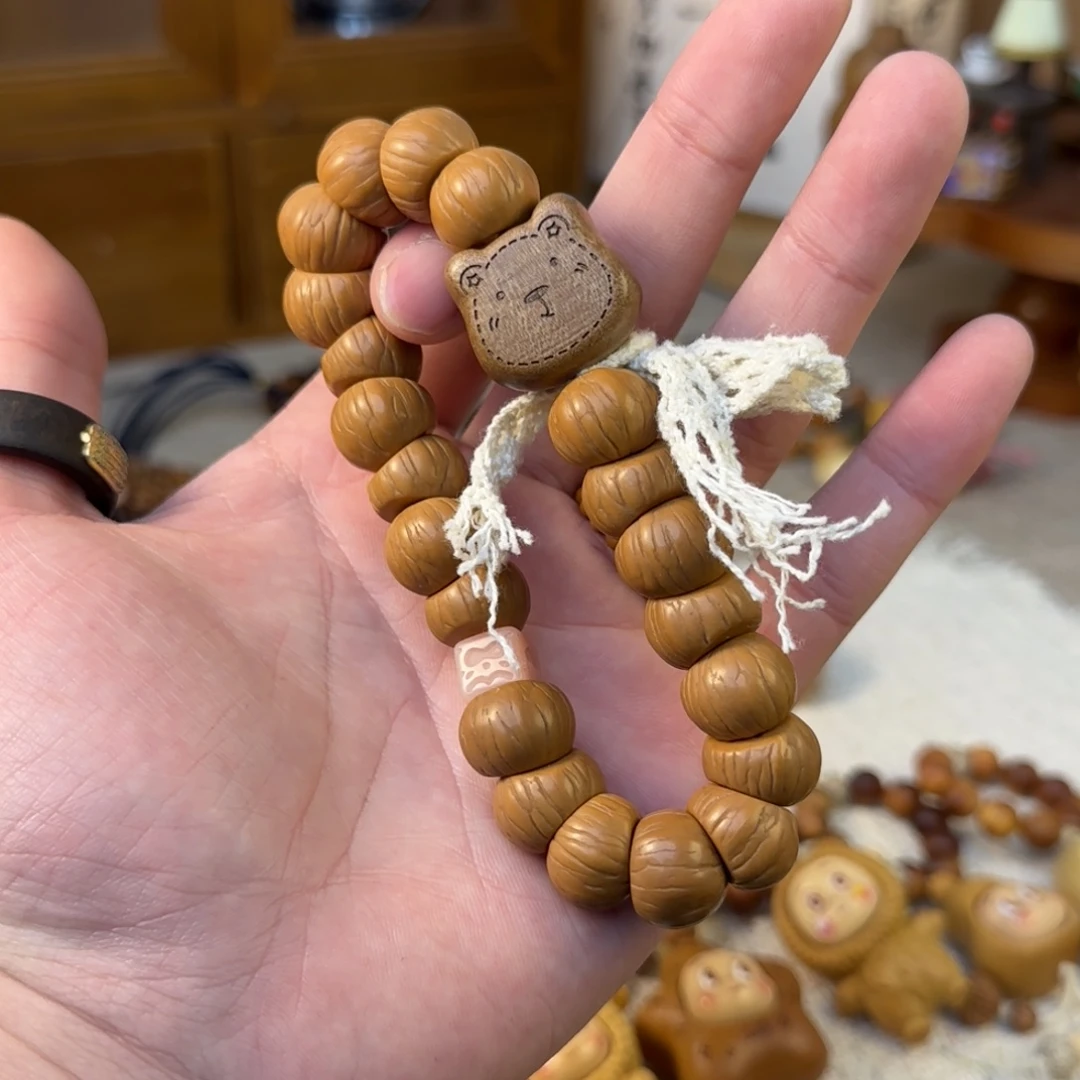 非洲檀香无事牌猴头大肠桃木小熊手串