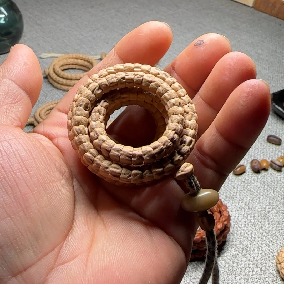 柏香籽/百香籽手串玩**恭