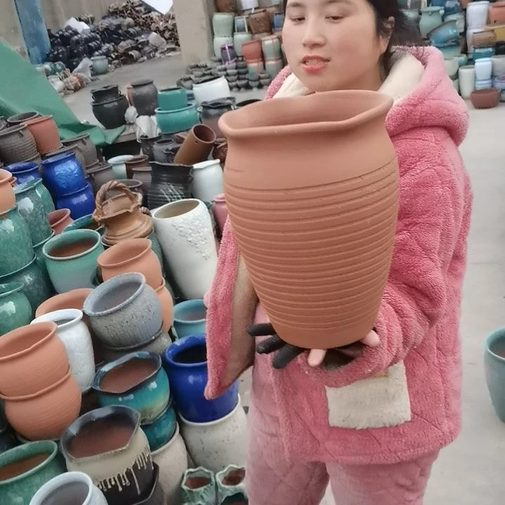 红陶口20高29瑕疵口变形扁了