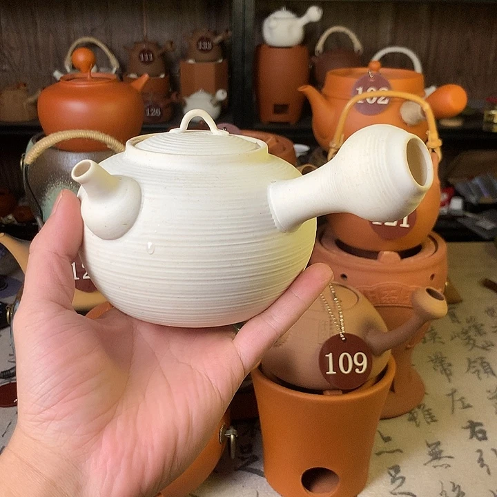 梅姐，玛瑙砂铫壶。