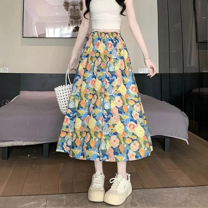 夏季新款艺术设计感水墨油画碎花半身a字裙中长款大摆七分裙