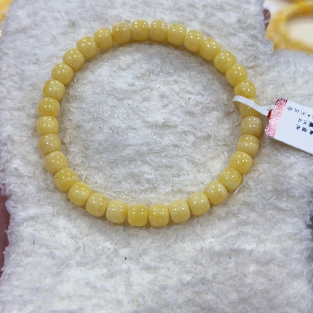 蜜蜡未镶嵌手链5.5m奶油黄顺色