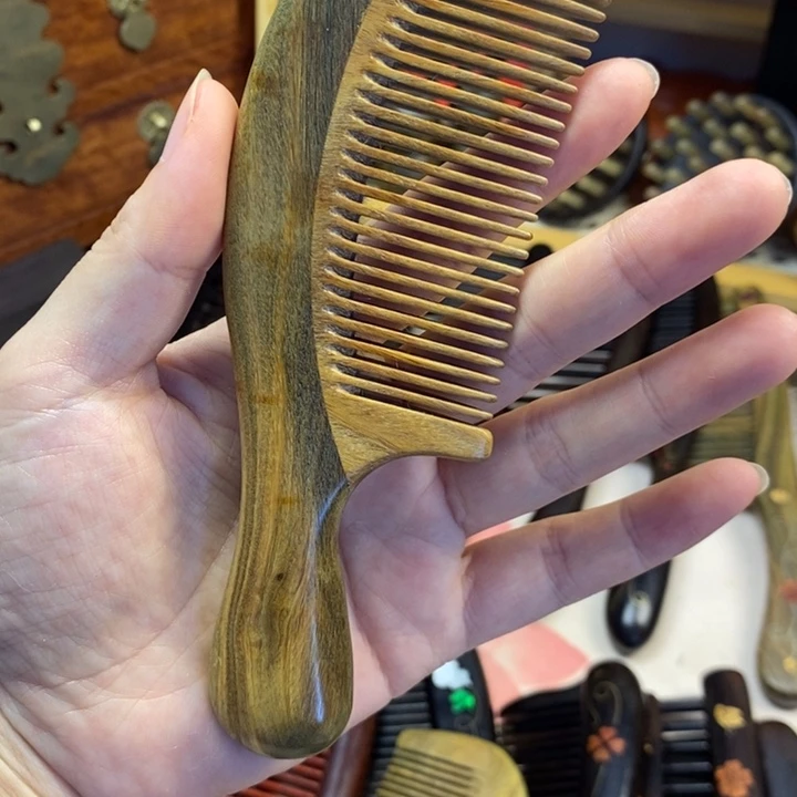 是***o绿毯木耙子绿檀木微瑕