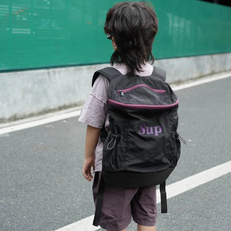 日系男童背包儿童字母简约休闲外出旅游双肩包女孩超轻小学生背包