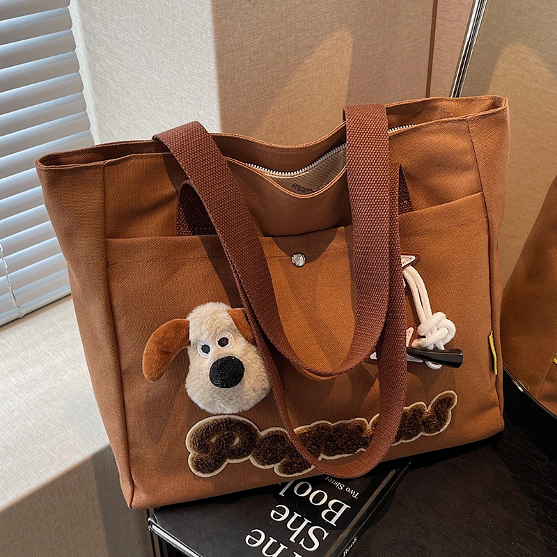 秋冬帆布包女大容量托特包休闲通勤卡通学生单肩手提袋轻便妈咪包