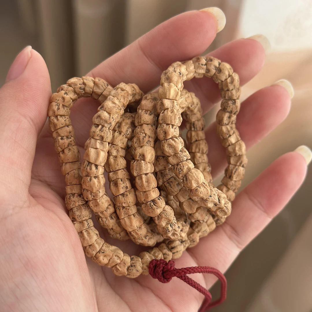 西藏热振百香籽文玩【鬼脸】大肠油皮高货毕业级