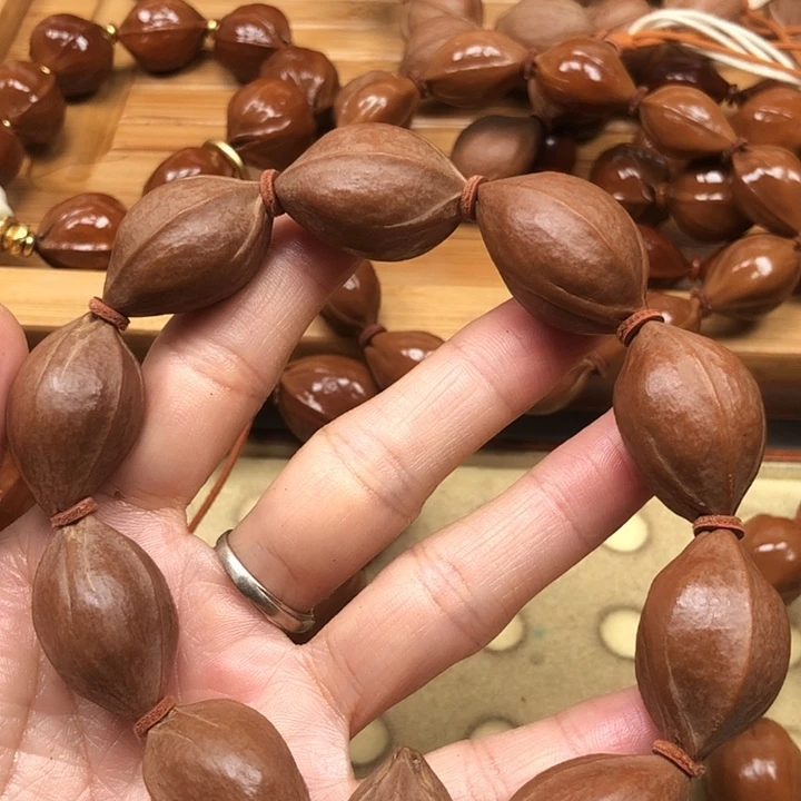 开***子手串橄榄核梅林铁核18 X29